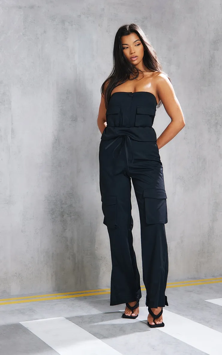 Combinaison bustier cargo noire à poches et taille volantée